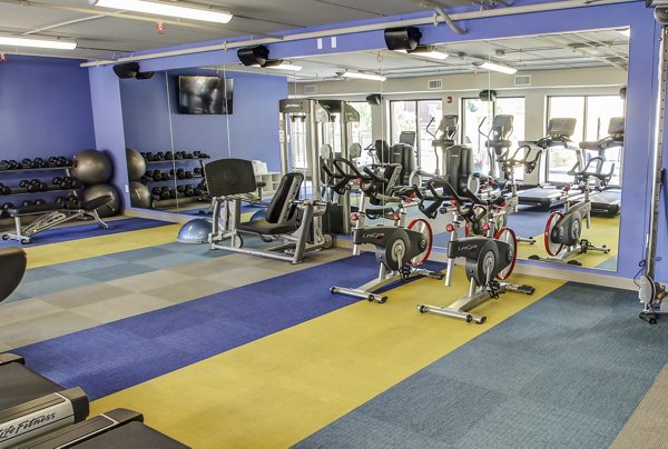 Fitness center featuring modern equipment at The Paxon Apartments