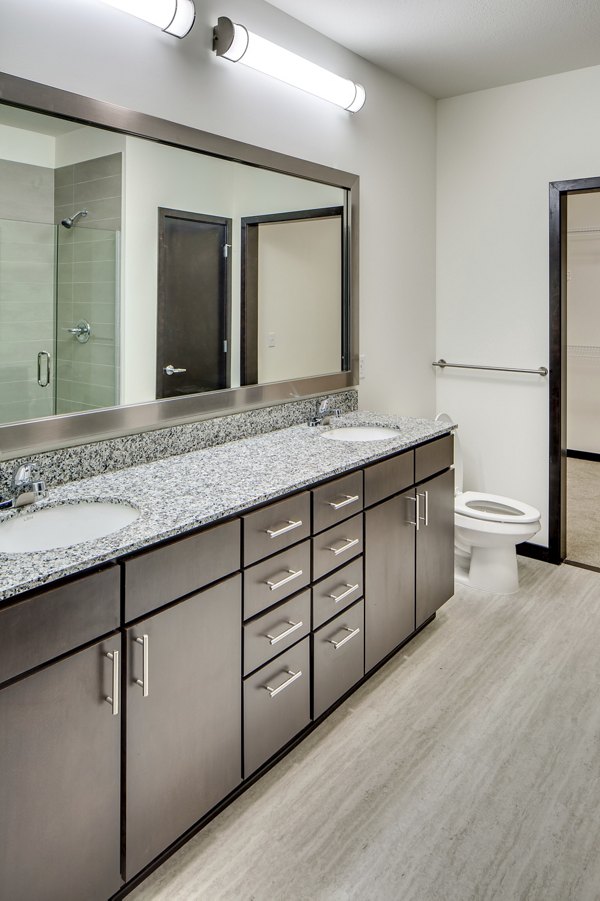 Modern bathroom with sleek fixtures in Velo luxury apartments