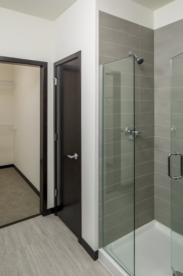 Modern bathroom with sleek fixtures at Velo luxury apartments