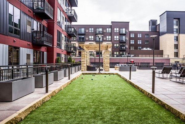 Modern sport court for basketball and tennis at Velo Apartments, offering premium recreational facilities for residents