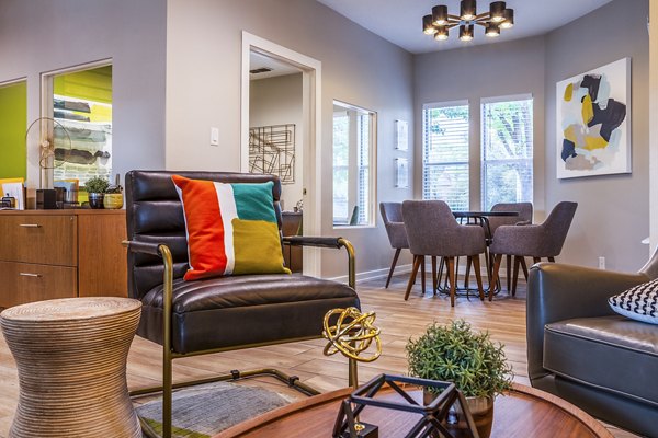 Elegant clubhouse with modern furnishings in the lobby at Spring Park Apartments