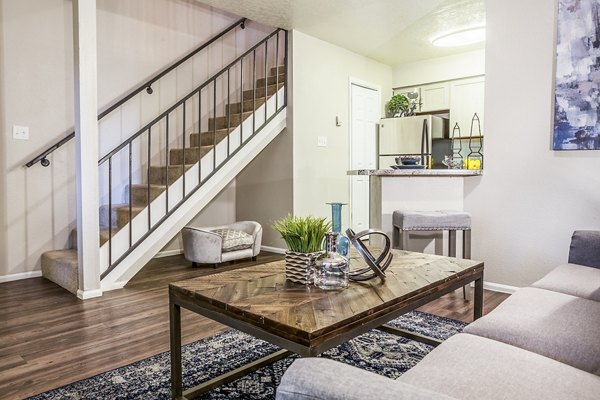Spacious living room with modern decor in Spring Park Apartments