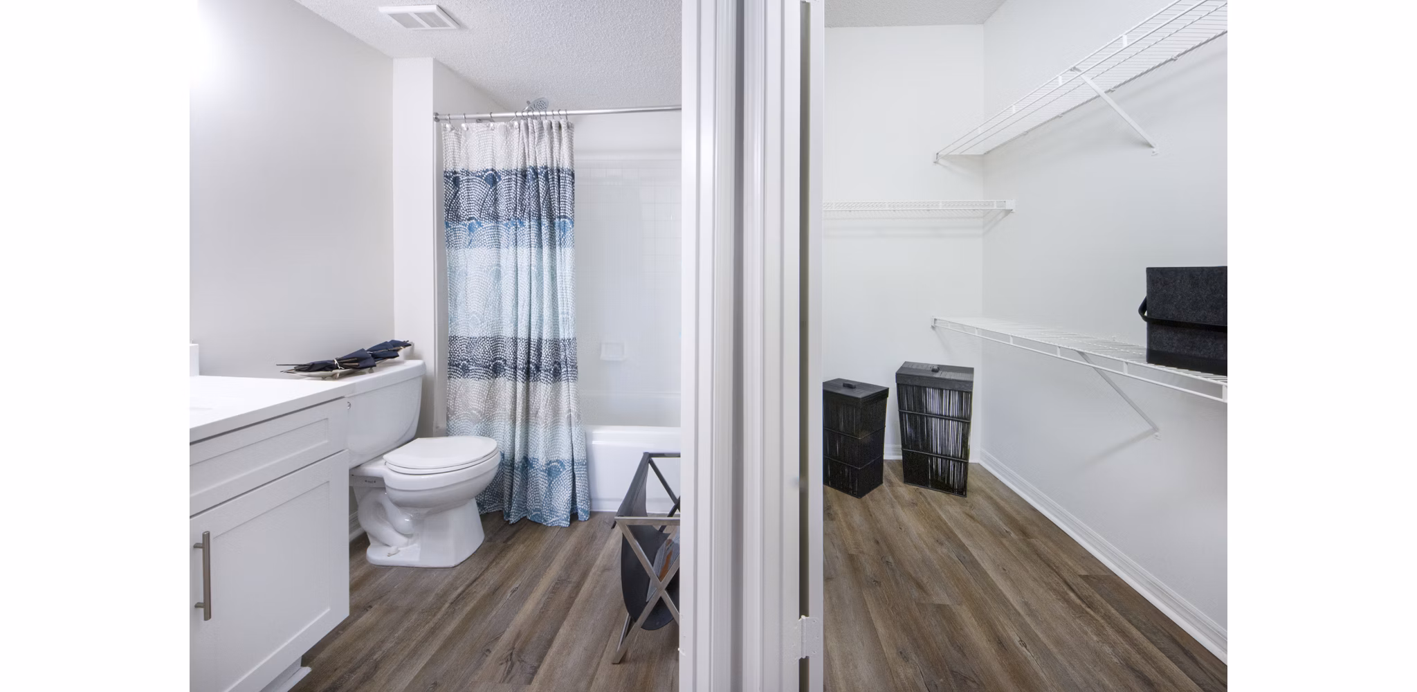 Cozy bedroom with modern decor at Mira Flores Apartments, luxury living in Paml Beach Gardens, FL.