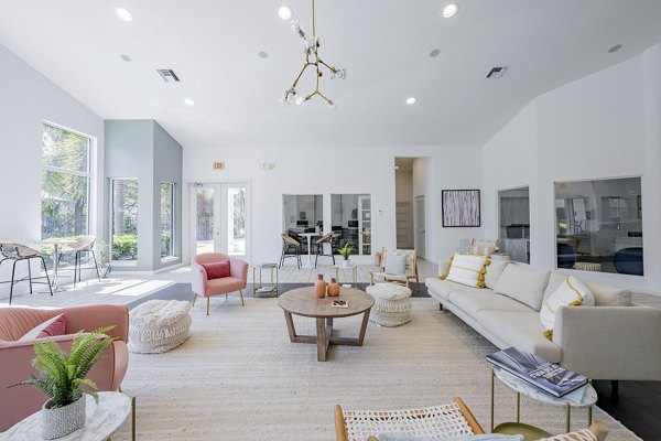 Modern clubhouse at Mira Flores Apartments featuring elegant decor and social spaces