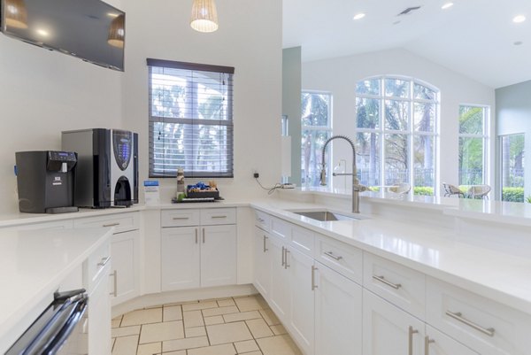 Stylish clubhouse with sophisticated decor at Mira Flores Apartments offering luxury amenities for residents