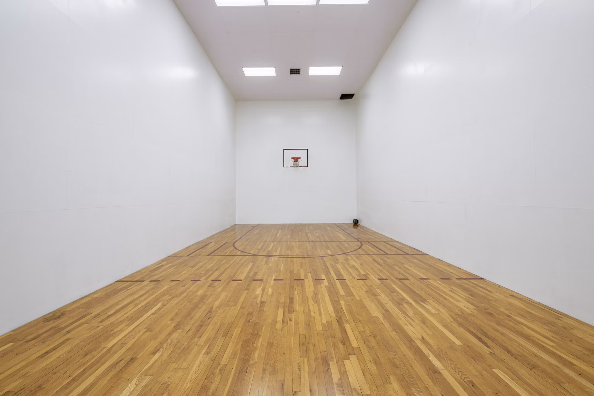 Outdoor sport court at Mira Flores Apartments featuring modern design for active living