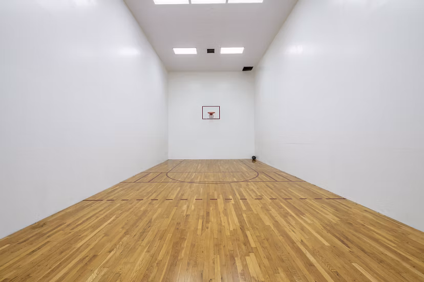 Outdoor sport court at Mira Flores Apartments featuring modern design for active living