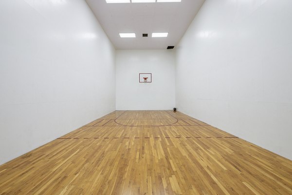 Outdoor sport court at Mira Flores Apartments featuring modern design for active living