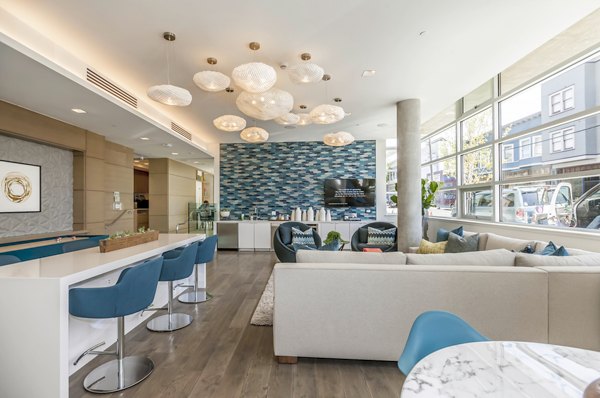 Clubhouse with stylish seating areas and modern decor at The Dwight luxury apartments