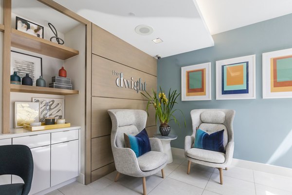 Clubhouse with elegant furnishings and modern decor at The Dwight luxury apartments