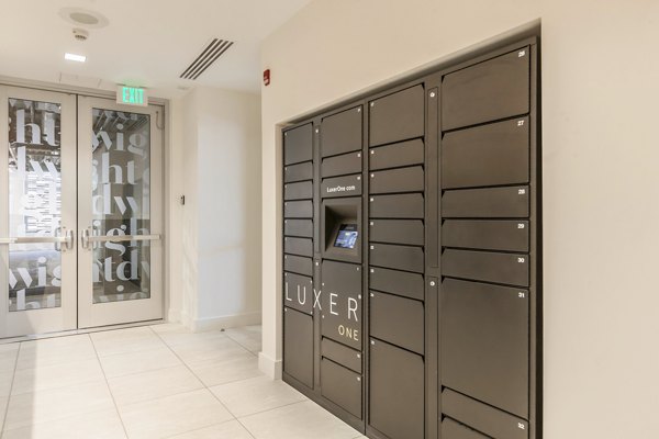 Mail room with modern design features at The Dwight, luxury apartments by Greystar