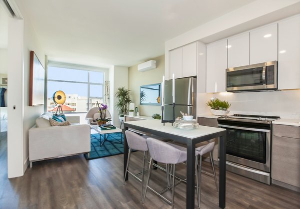 Dining room featuring elegant furnishings and modern lighting at The Dwight luxury apartments
