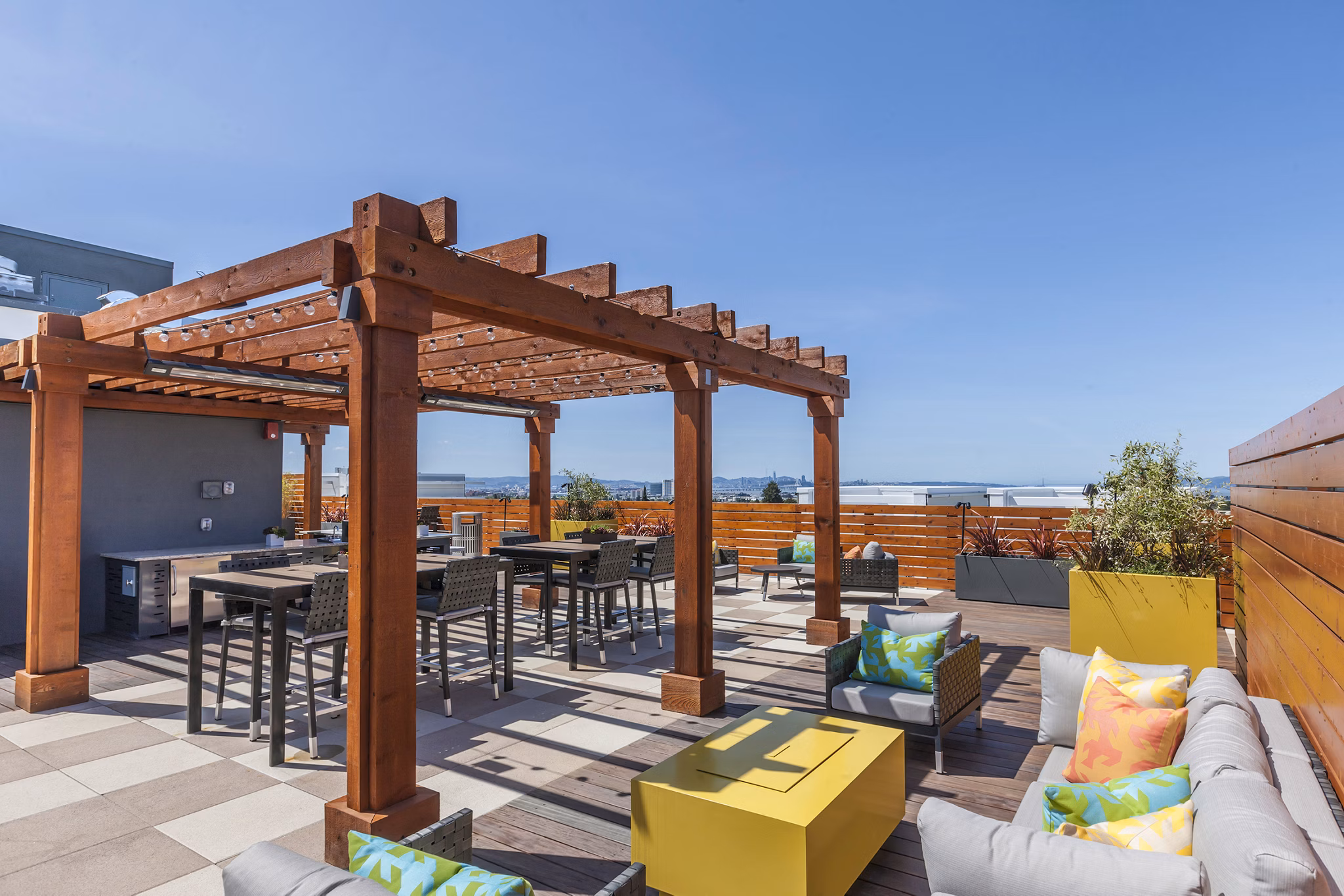 Outdoor social space with a modern grill area at The Dwight luxury apartments