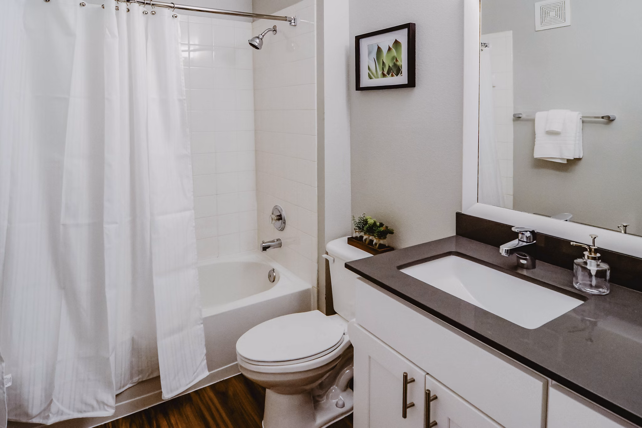 Contemporary bathroom with marble countertops at Finley at Fairfax Corner
