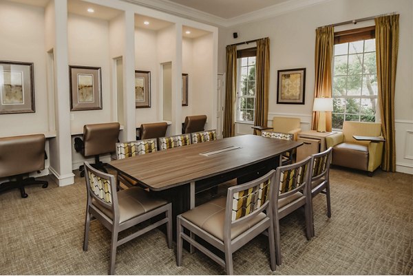Meeting room with modern furnishings and large conference table at Finley at Fairfax Corner luxury apartments