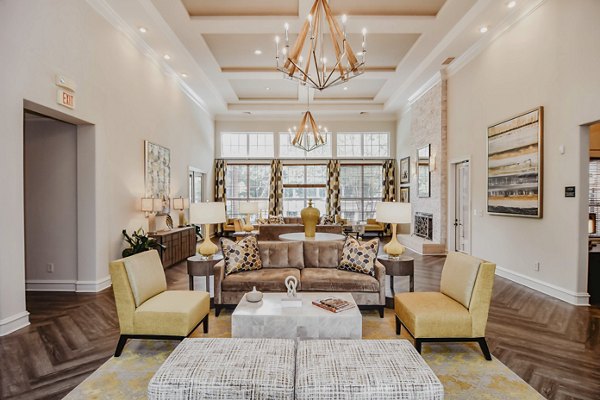 Clubhouse with modern furnishings at Finley at Fairfax Corner apartments