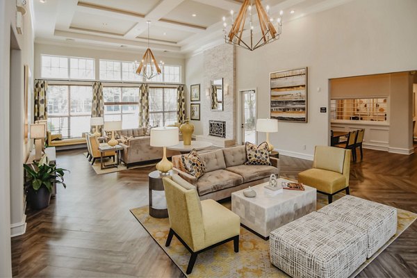 Clubhouse with modern seating and game room at Finley at Fairfax Corner luxury apartments