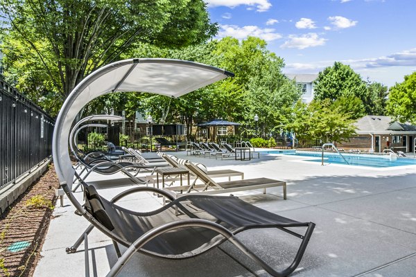 Resort-style outdoor pool area at Finley at Fairfax Corner Apartments