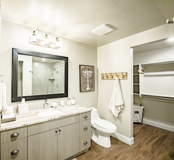 Modern bathroom with sleek fixtures at Hardware Village Apartments