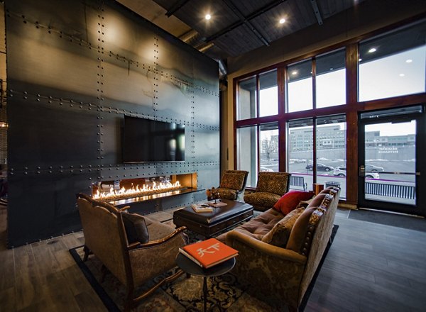 Clubhouse with modern seating and contemporary decor at Hardware Village Apartments, offering luxury community space for residents
