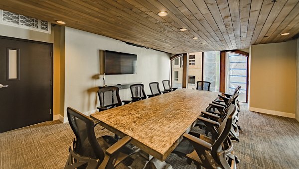 Meeting facility featuring modern design and conference seating at Hardware Village Apartments in Salt Lake City