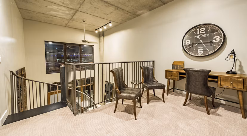 Contemporary kitchen with stainless steel appliances in Hardware Village Apartments