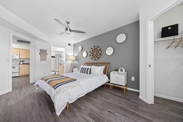 Monterra Apartments: Cozy bedroom with stylish decor and natural light