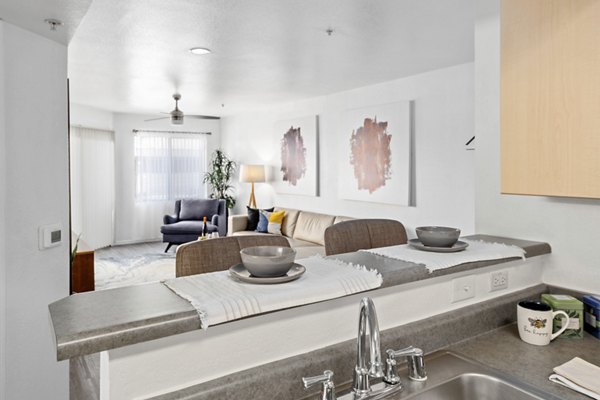 Spacious kitchen featuring modern appliances and sleek cabinetry in Monterra Apartments