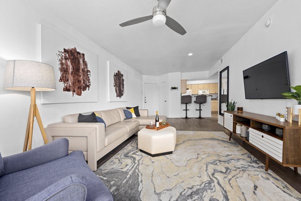 Modern living room with stylish dÃ©cor and natural light at Monterra Apartments