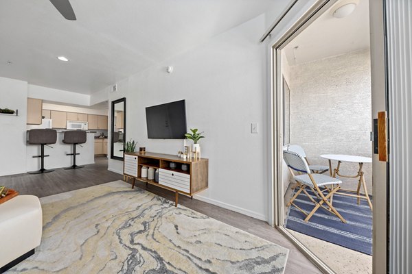 Living room at Monterra Apartments with chic design and modern furnishings, highlighting luxury living at Greystar's high-end properties