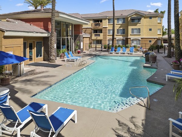 Resort-style pool with lush landscaping at Monterra Apartments, a luxury community offering premier amenities in prime location