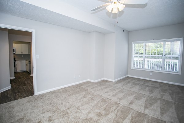 Cozy bedroom with modern decor at The Prato at Midtown Apartments