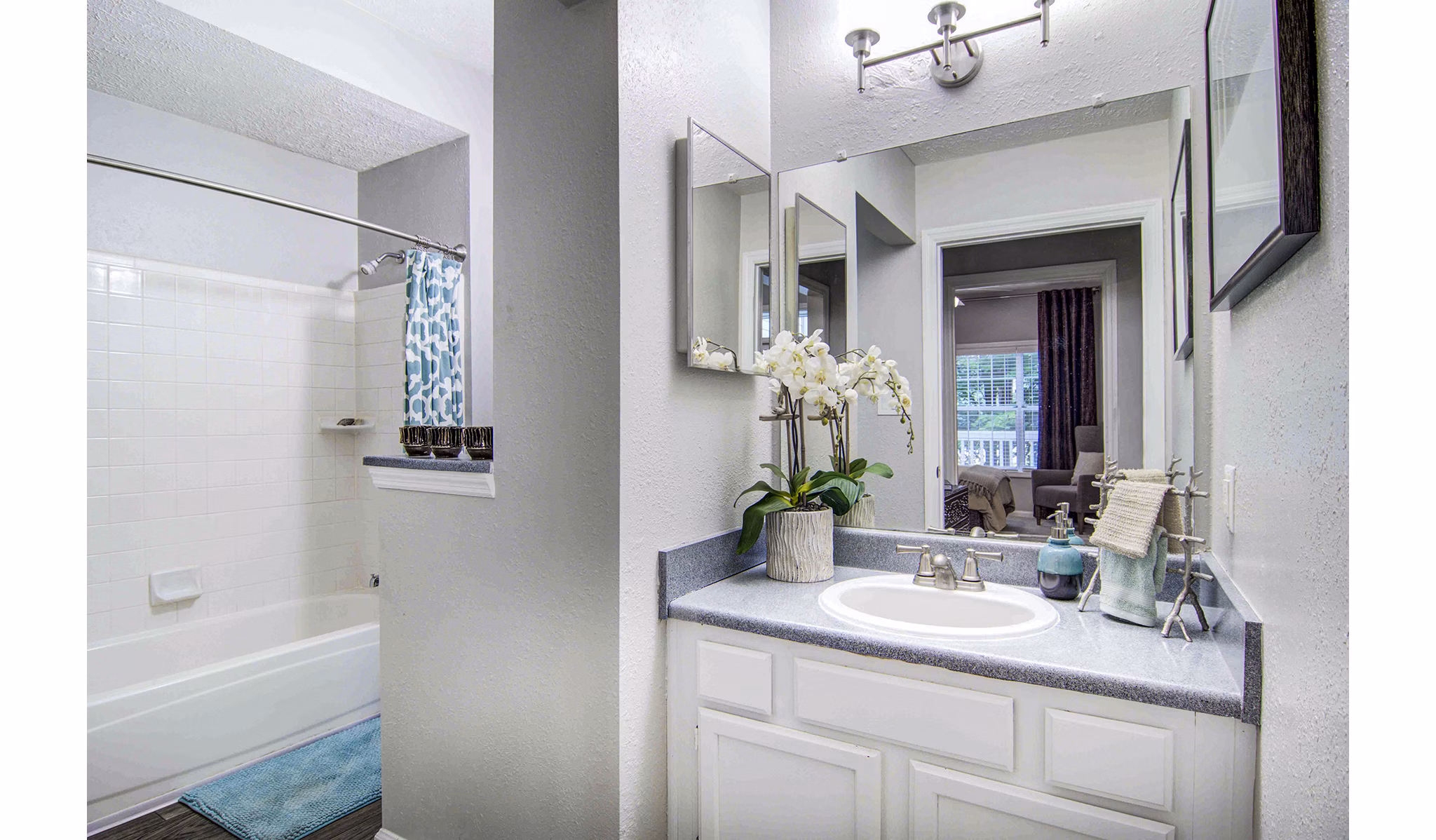 Luxurious bathroom featuring modern fixtures at The Prato at Midtown Apartments