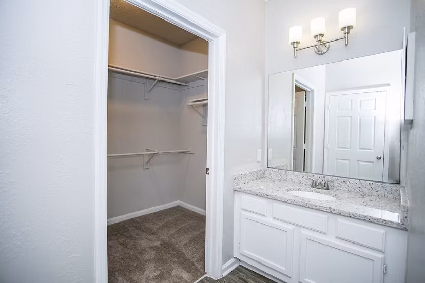 Luxurious bathroom with modern fixtures at The Prato at Midtown Apartments