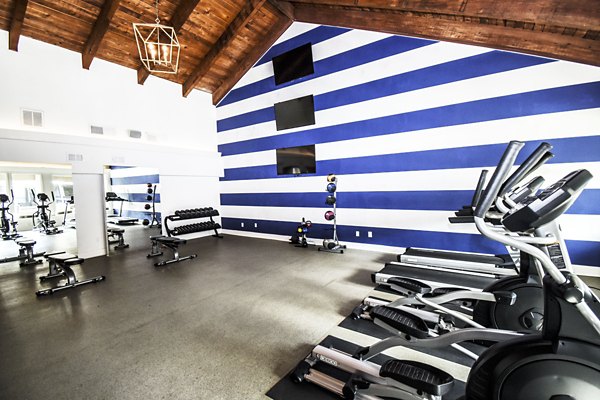 Modern fitness center with state-of-the-art equipment at Waterloo Flats luxury apartments