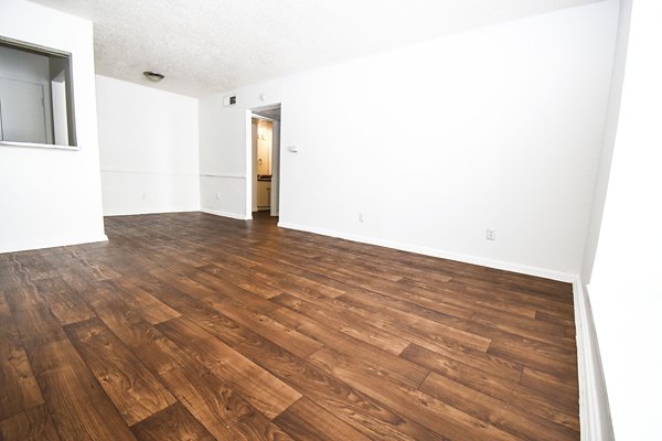 Open-plan kitchen with stainless steel appliances at Waterloo Flats Apartments