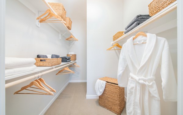 Spacious closet with built-in shelving at Overture Centennial luxury apartments