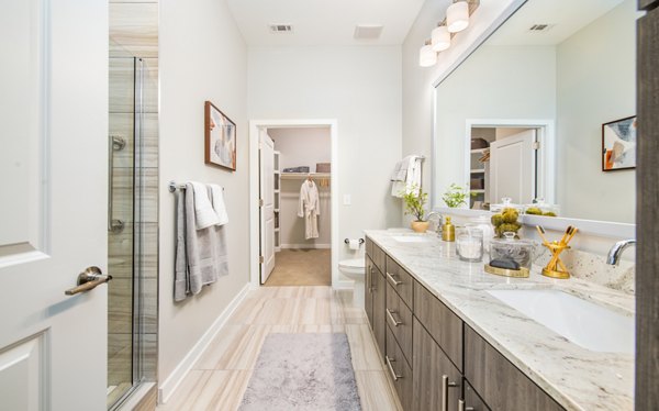 Modern bathroom with sleek fixtures at Overture Centennial Apartments in Nashville, designed for luxury living