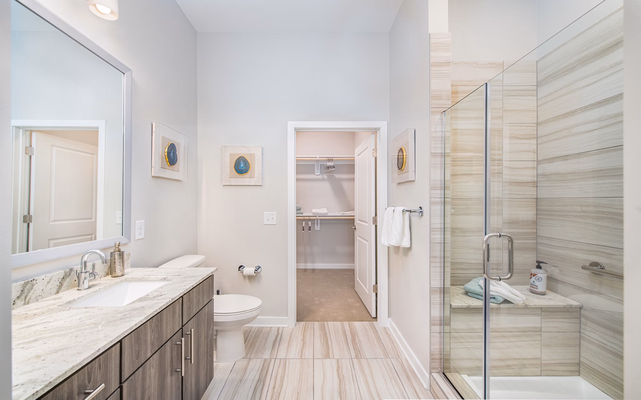 Modern bathroom with sleek fixtures and spacious design at Overture Centennial Apartments, ideal for a luxurious living experience