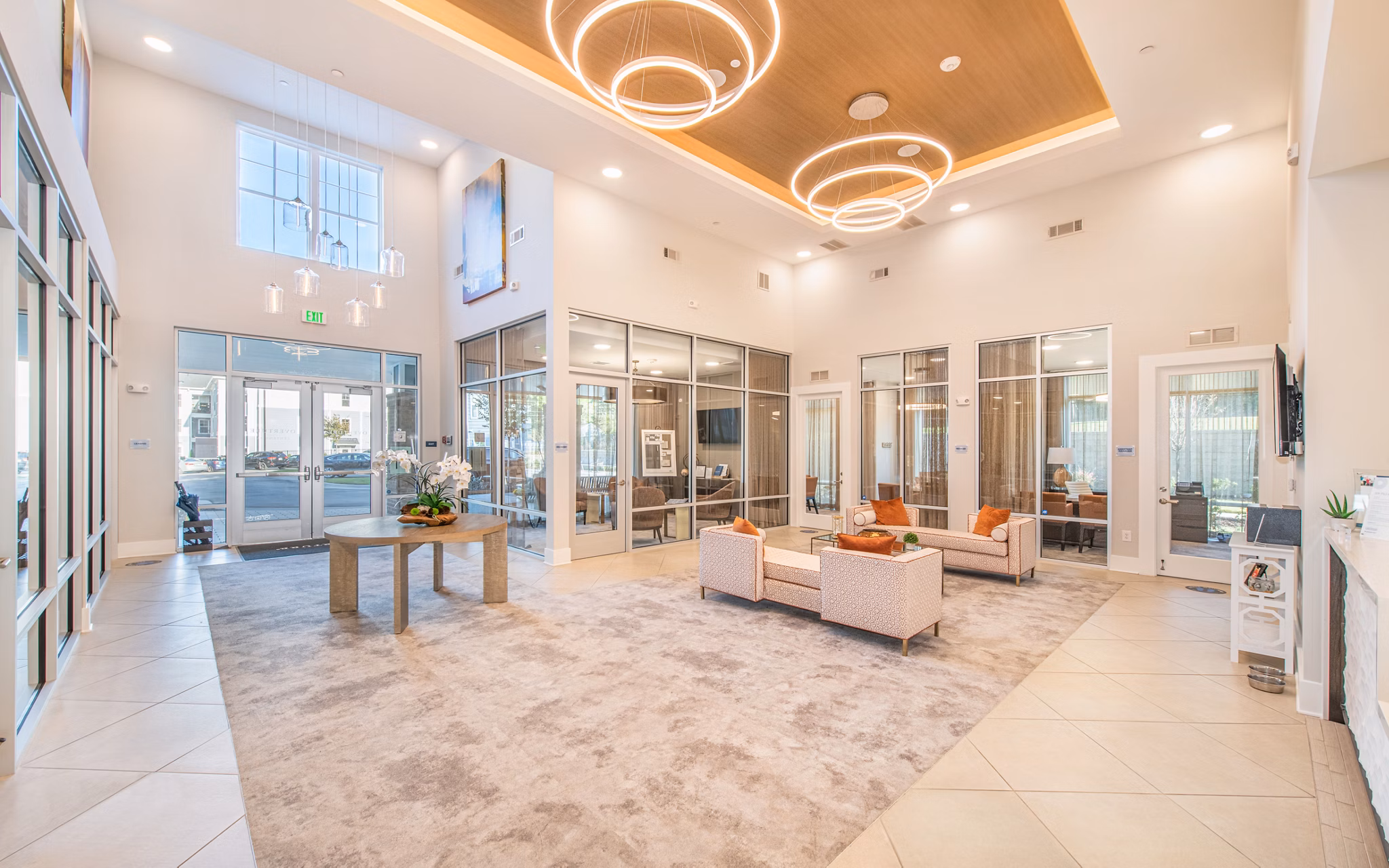 Clubhouse featuring modern furnishings and open seating areas at Overture Centennial Apartments Ideal for social gatherings and relaxation in luxury setting