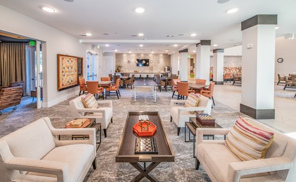Clubhouse featuring modern design and comfortable seating at Overture Centennial Apartments in Nashville