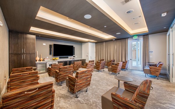 Theater with plush seating and state-of-the-art acoustics at Overture Centennial Apartments, a luxury Greystar community