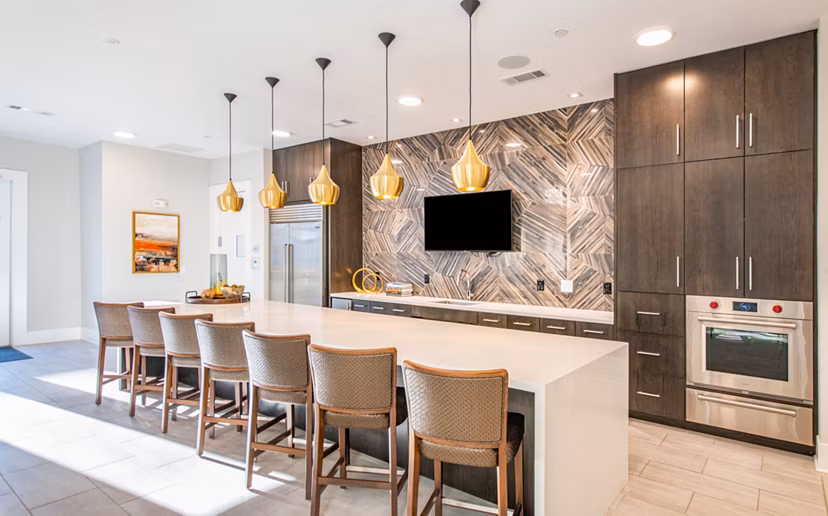Clubhouse with modern decor and social spaces at Overture Centennial Apartments