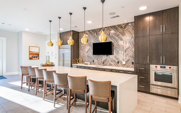 Clubhouse with modern decor and social spaces at Overture Centennial Apartments