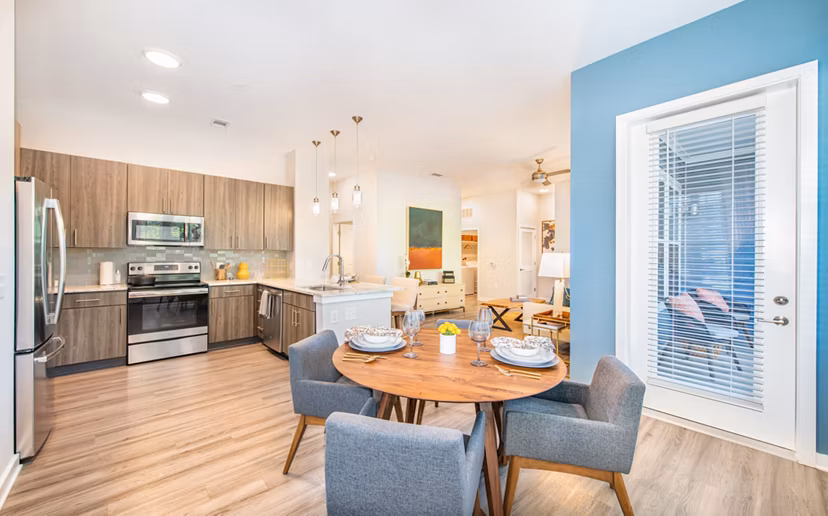 Elegantly designed dining area with modern furnishings at Overture Centennial Apartments, perfect for luxury living and entertaining