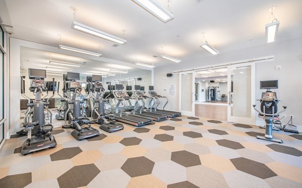 Modern fitness center with state-of-the-art equipment at Overture Centennial Apartments, ideal for luxury living and wellness