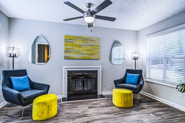 Spacious, modern living room with contemporary decor at Junction at Vinings Apartments