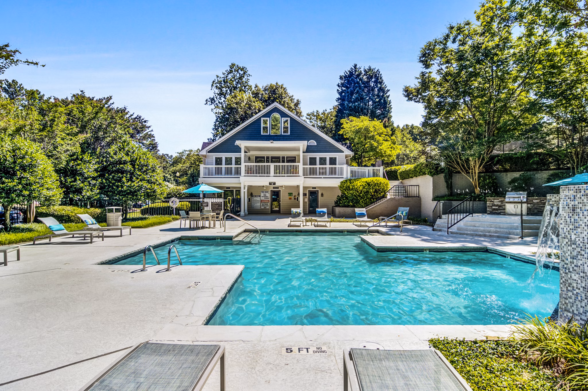 Resort-style pool at Junction at Vinings Apartments offering luxurious relaxation in a premium setting