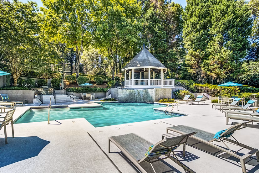 Rooftop pool with spacious sun deck at Junction at Vinings Apartments