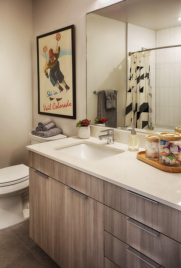 Bathroom with modern fixtures and sleek design in SOVA Apartments